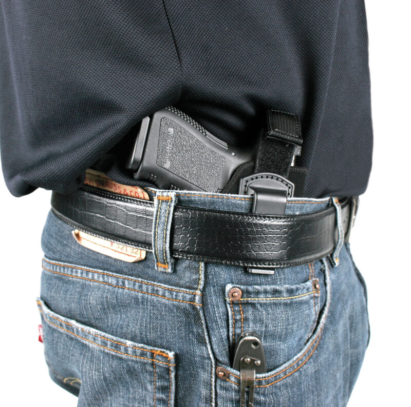 Inside-the-pants holster w/retention strap - Holsters